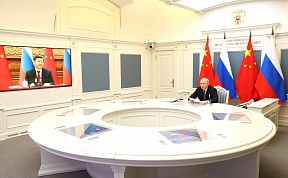 俄罗斯总统普京同中国国家主席习近平举行视频会晤 俄罗斯总统普京同中国国家主席习近平举行视频会晤